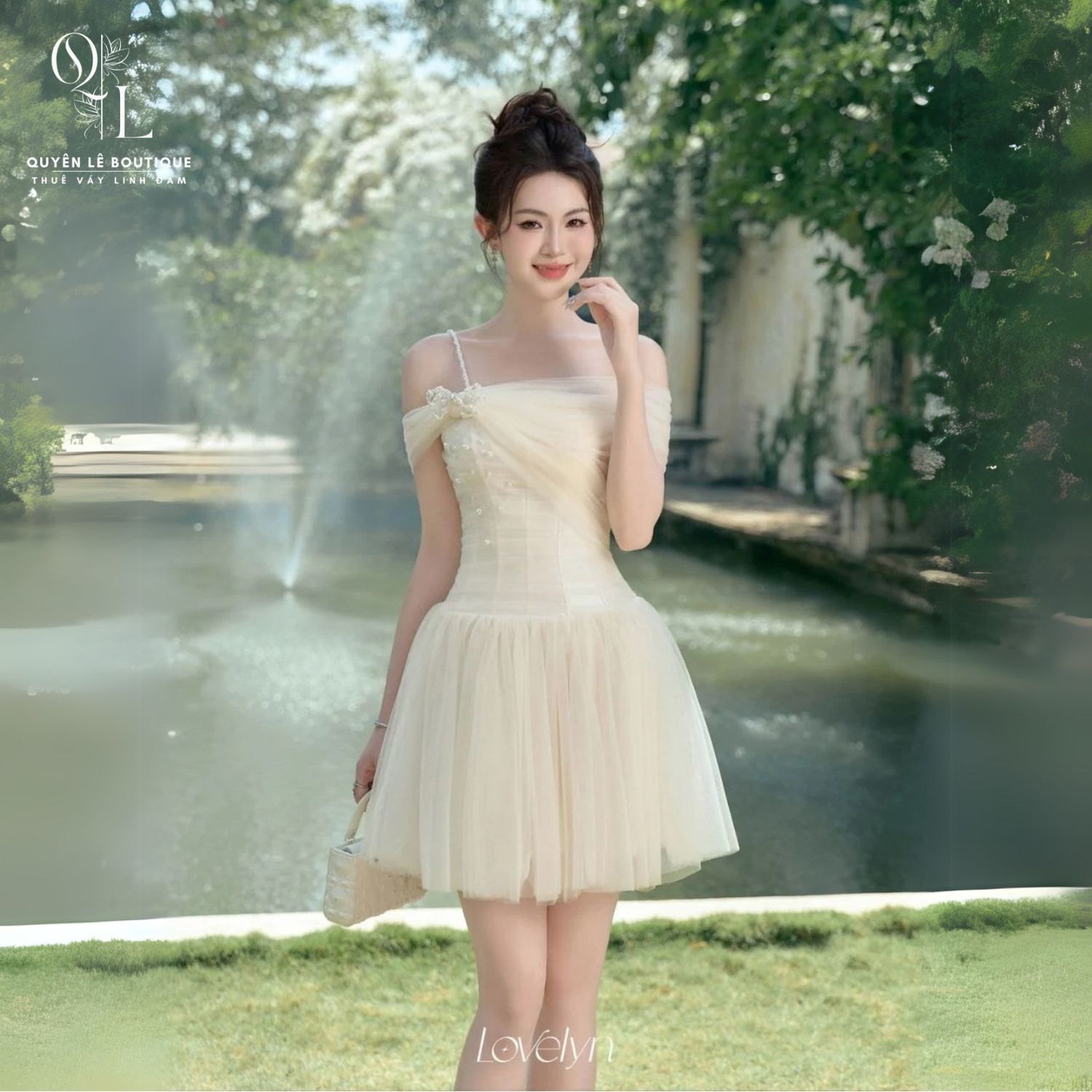 1706 Tiệc ngắn kem trễ vai đính ngọc