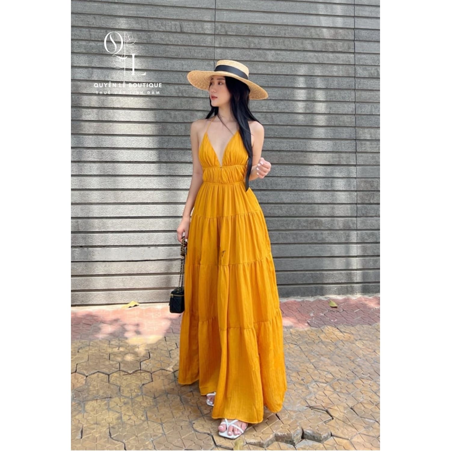966 Váy du lịch dài vàng dây buộc hở lưng