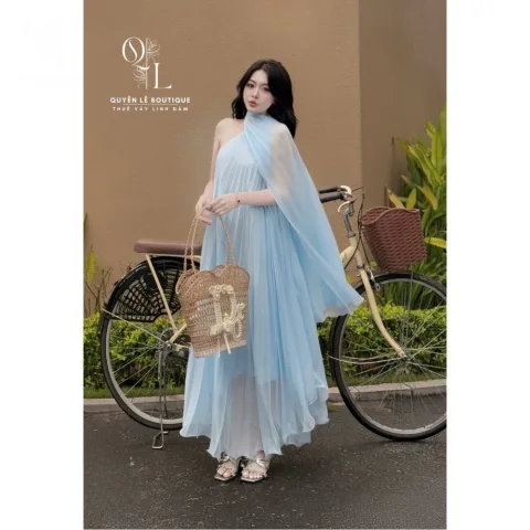 Váy du lịch xanh xếp ly