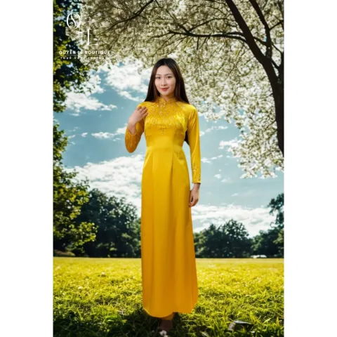 731 Áo dài mẹ vàng cườm cổ  size m